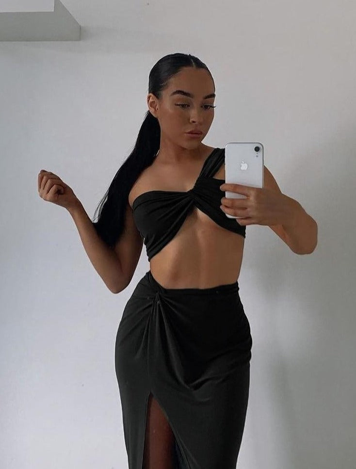 women's black maxi skirt and bra crop top